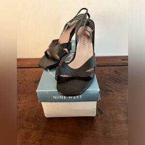 Nine West Black High Heel.Size 9M. Good Preowned Condition. 3 1/2 inch Heel.